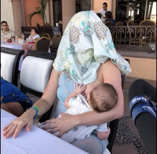 Mom ordered to cover herself up when she breastfeeds