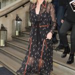 Selena Gomez Dons Semi-Sheer Shirt Dress After Exiting Coach Store on Regent Street, Flaunting a Hint of Leg