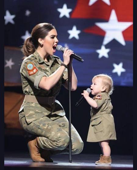 ** his couple performs the most famous 90s hit. The audience stands and applauds.