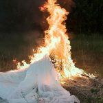 Woman Sees Her Sister Burn Her Dress on the Wedding Day, but Thanks Her When She Finds Out the Reason