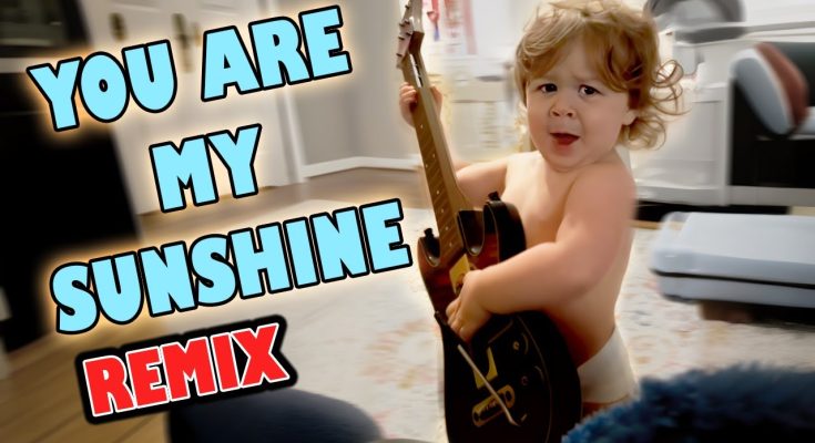 WOW! 2 years old plays the guitar and start singing with his beautiful voice!