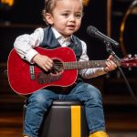 A 1st grader takes the stage and leaves the audience in awe with an unexpectedly mature rendition of a Johnny Cash classic