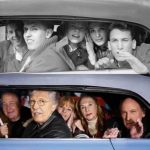 In 1964, Ringo Starr snapped a photo of some high school students who had skipped class to see the Beatles during their first trip to the US. 50 years later, the group reunited and recreated the photo.